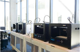 row of 3D printers