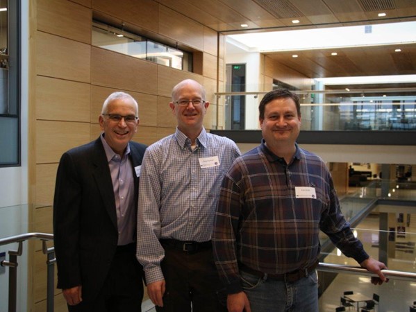 Photo: Provost Jerry Baldasty, Gary Holman, Eric Smith